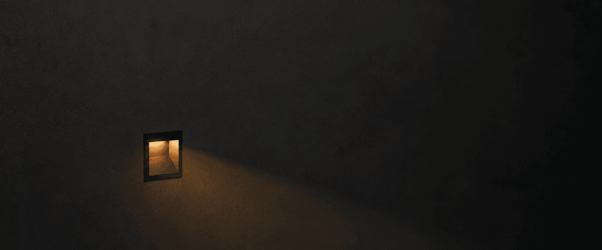 A single point of clarity emerging from darkness, representing a direct answer surfacing from unstructured content