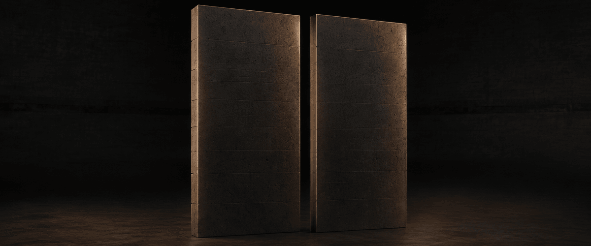 Two nearly identical dark slab forms standing side by side under the same warm light, one with faint underlying seams and one more seamlessly built, representing two websites that look the same on the surface but aren't built the same underneath
