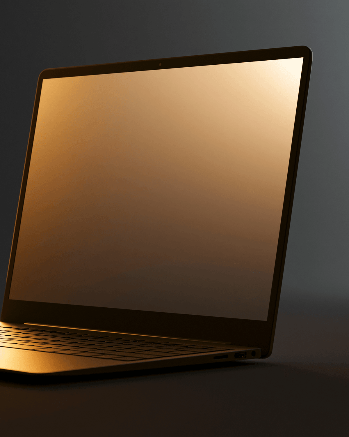 Laptop screen glowing in a dark room