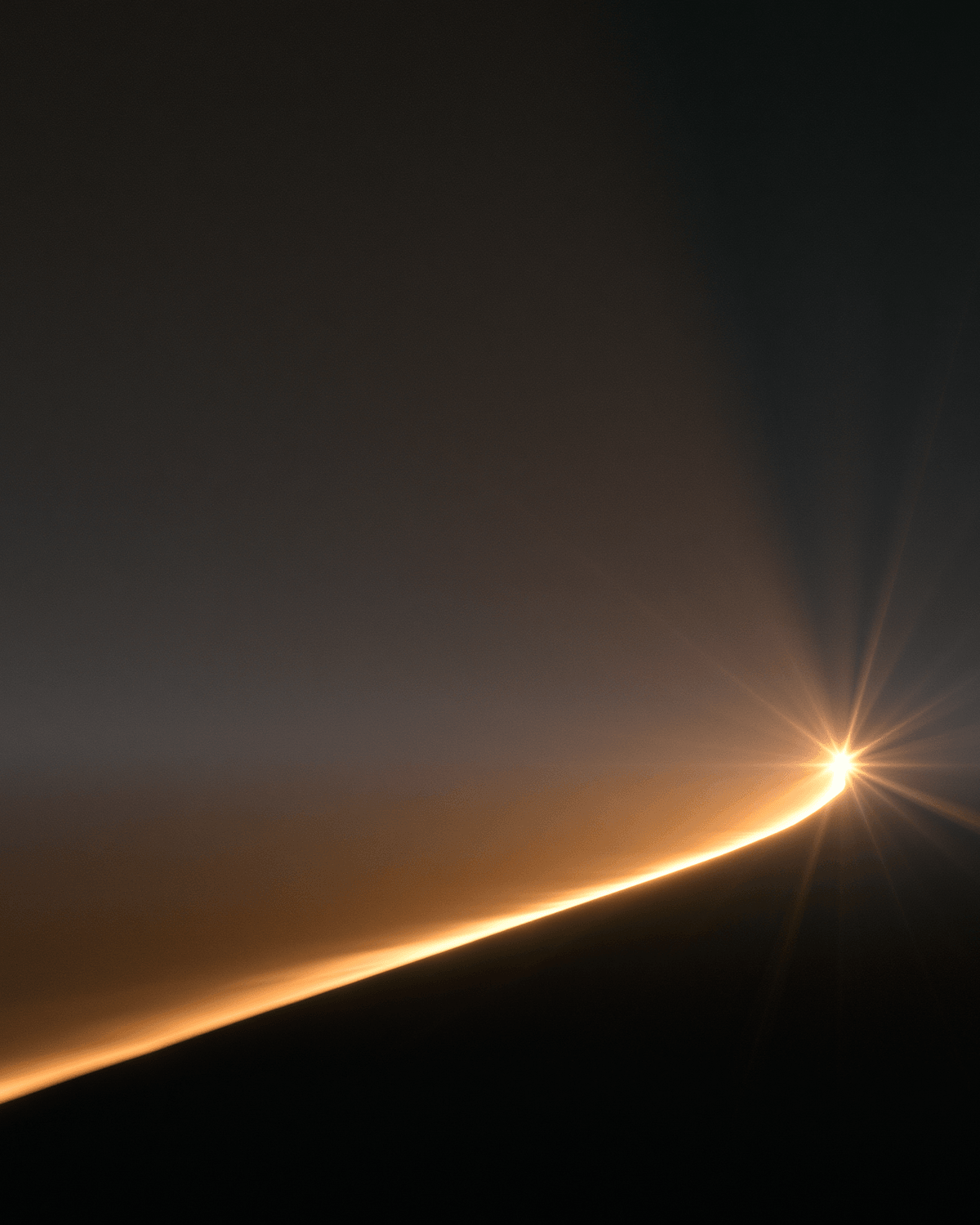 A single point of light with a starburst flare, traveling through darkness, representing a message being sent